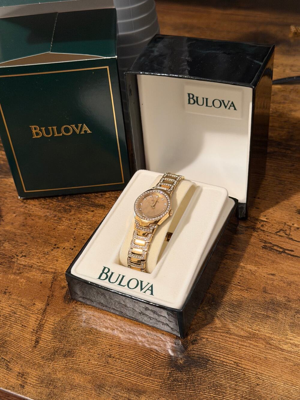 Bulova Gold Tone Crystal Bezel Champagne Dial Women’s Quartz Watch With Box